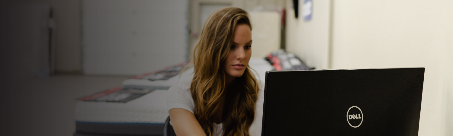 image of women working on a laptop